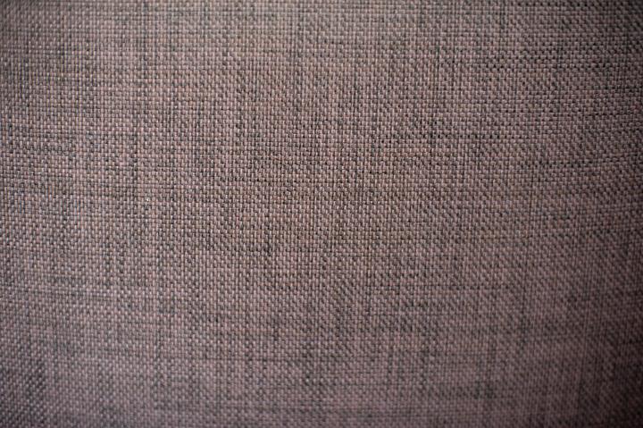 woven textile background texture in muted purple
