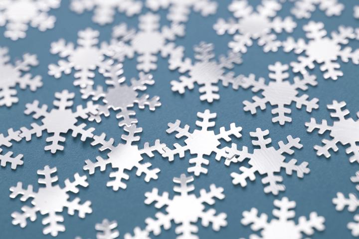 Close up Snowflakes Pattern on Blue Gray Background for Wallpaper Designs.