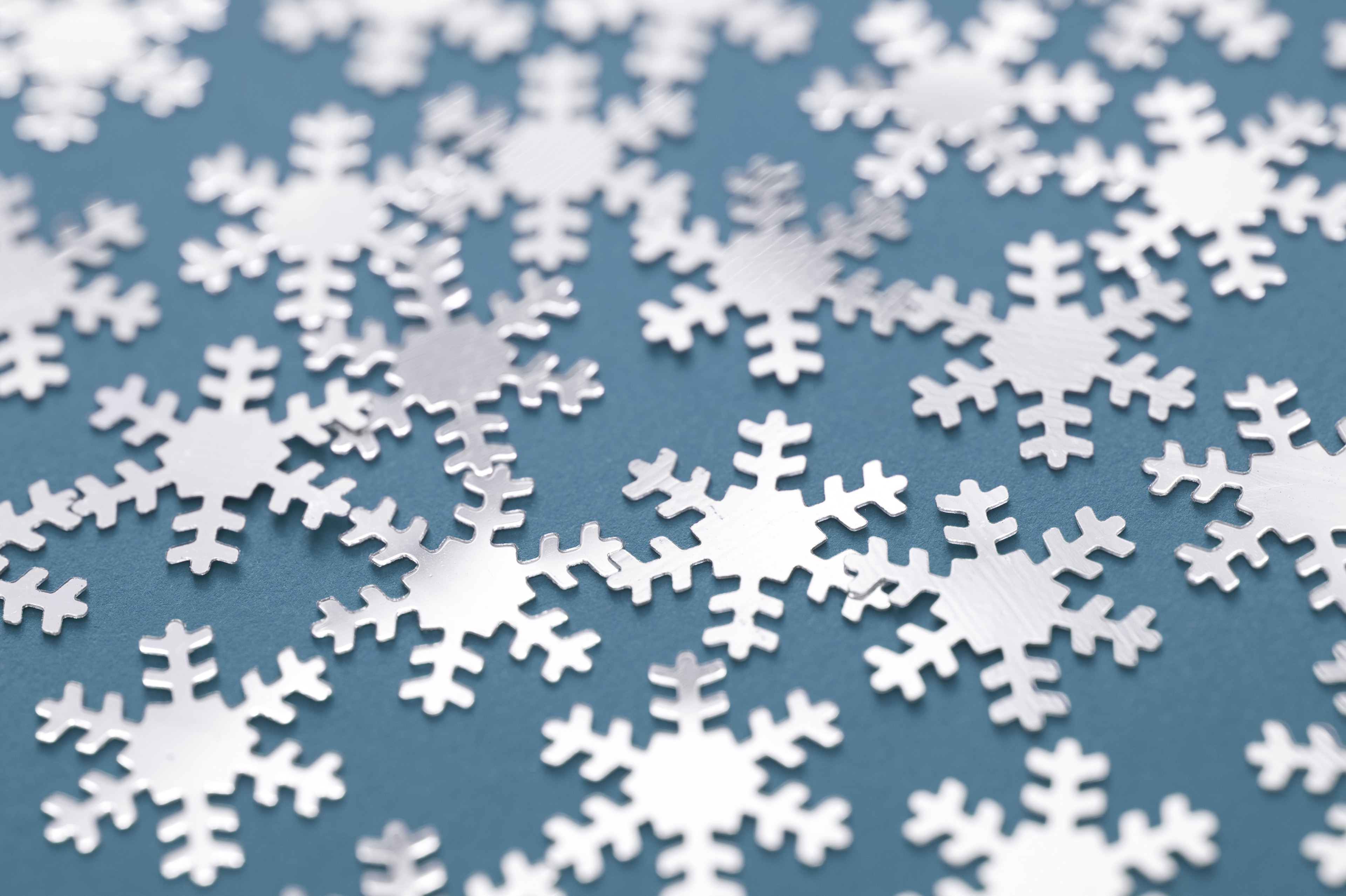 Free Image Of Snowflakes On Blue Gray Background For Wallpapers