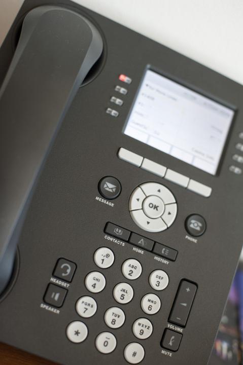 Close up Shot of Conceptual Black Office Telephone on Top of the Table