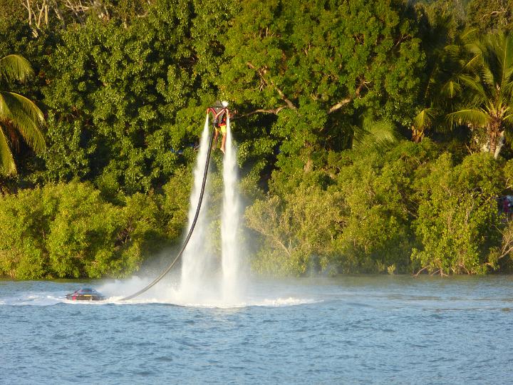 Jet Boarding or Fly Boarding, hovering in the air on a stream of high pressue water from a jetski