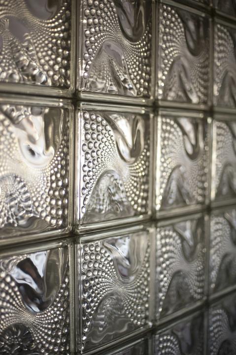 Close Up Architectural Detail of Glass Block Wall with Swirly Design