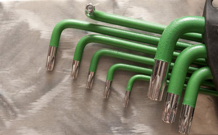 Close-up of green hex wrench tool set in case