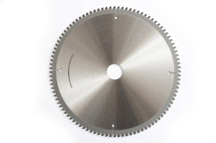 A metallic metal circular saw wheel blade isolated on a plain white background.