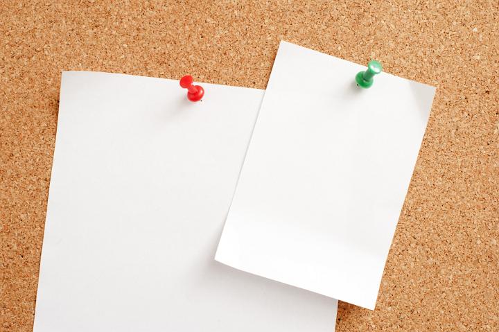 Two Blank White Notice Papers Pinned on Brown Cork Board, Emphasizing Copy Space.