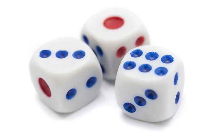 Close up Three White Gaming Dice with Red and Blue Marks, Used for Generating Random Numbers Games, Isolated on a White Background
