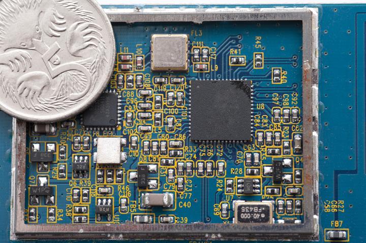 tiny electronic circuits compared to a 5 cent coin