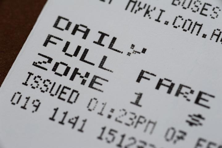 Close Up Detail of Bus Ticket with Full Fare Payment in Zone One