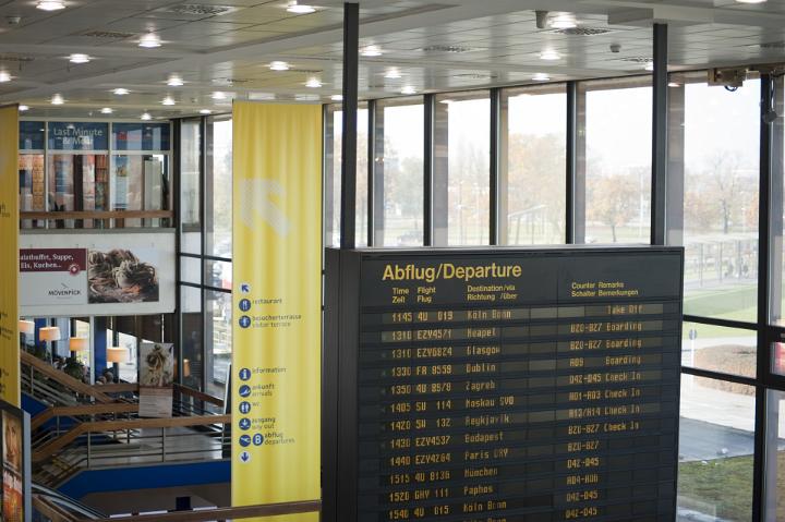 Departure Board at the Second Floor of Modern Architectural Airport Building.